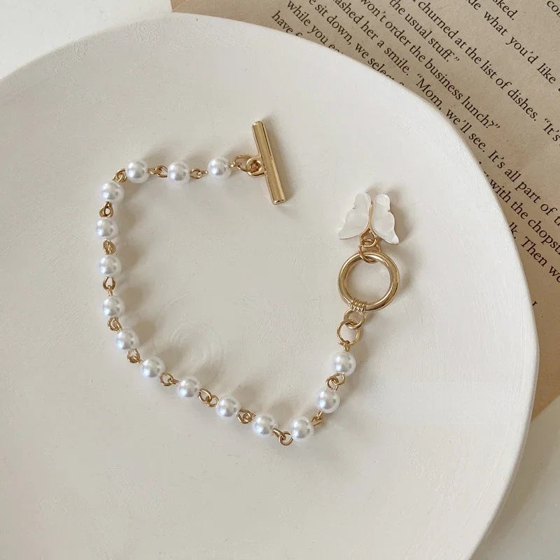 Butterfly Pearl Charm Bracelet